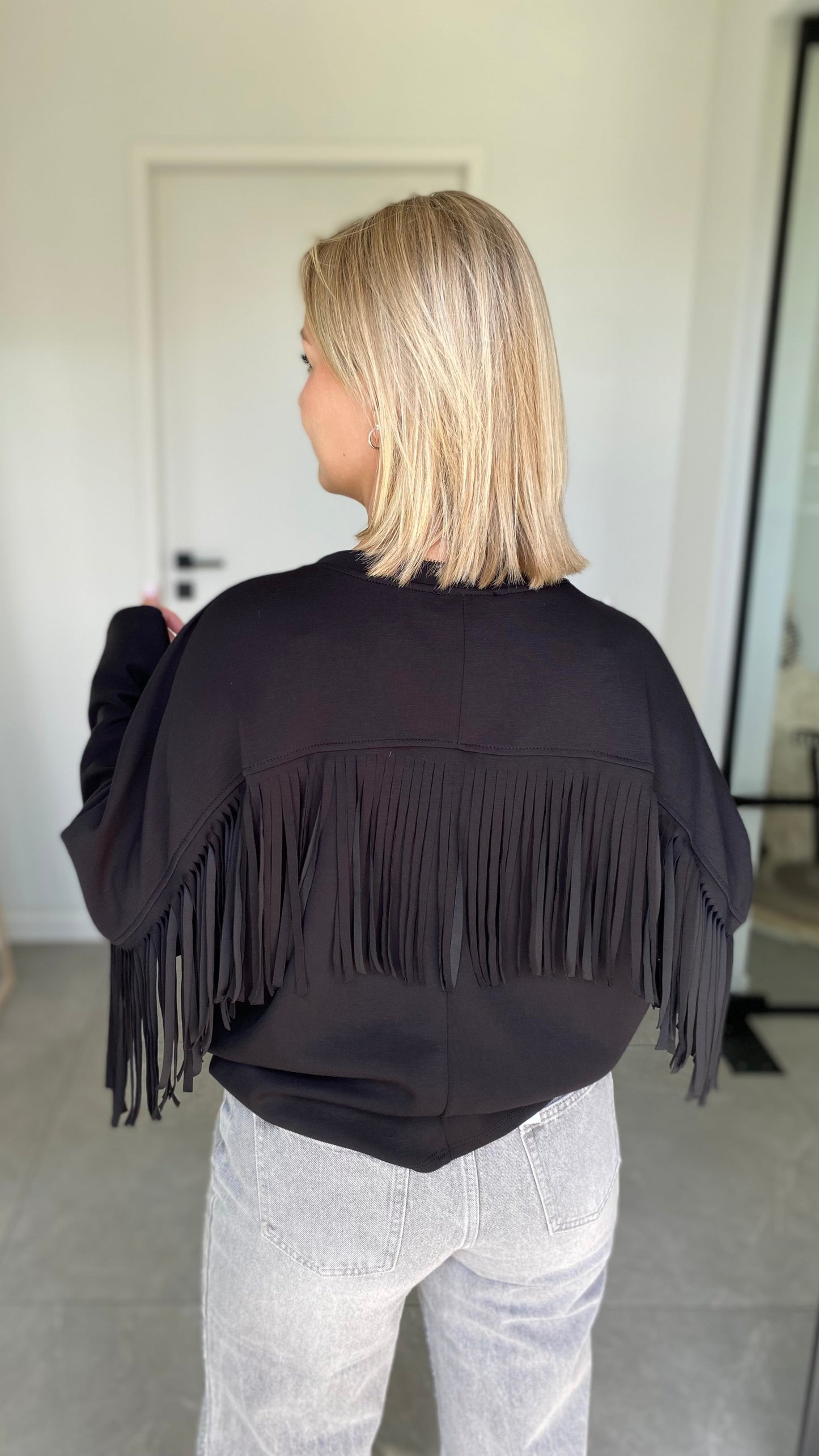 Black fringe sweater