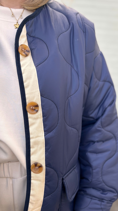 Blue jacket ecru trim